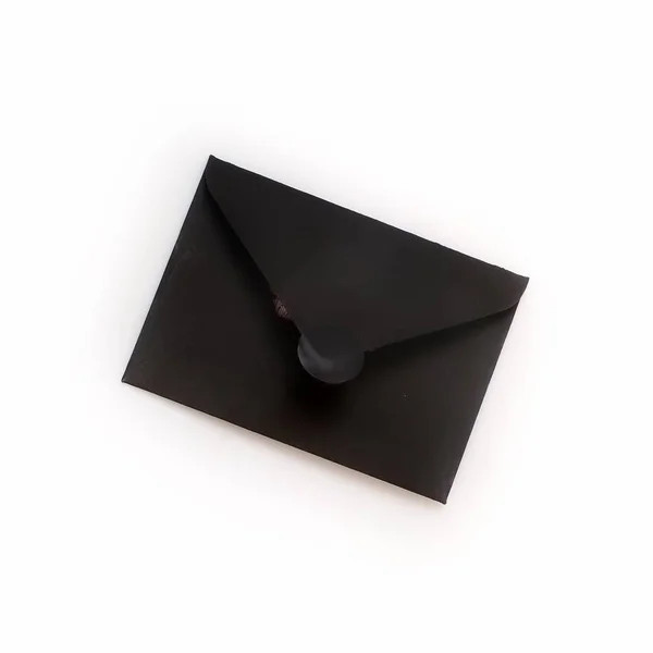 Romantic composition with black envelopes on a white background