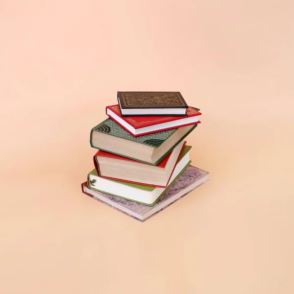 Book isolated on pink background