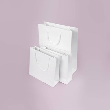 İzole basit arka plan üzerinde beyaz kağıt torba