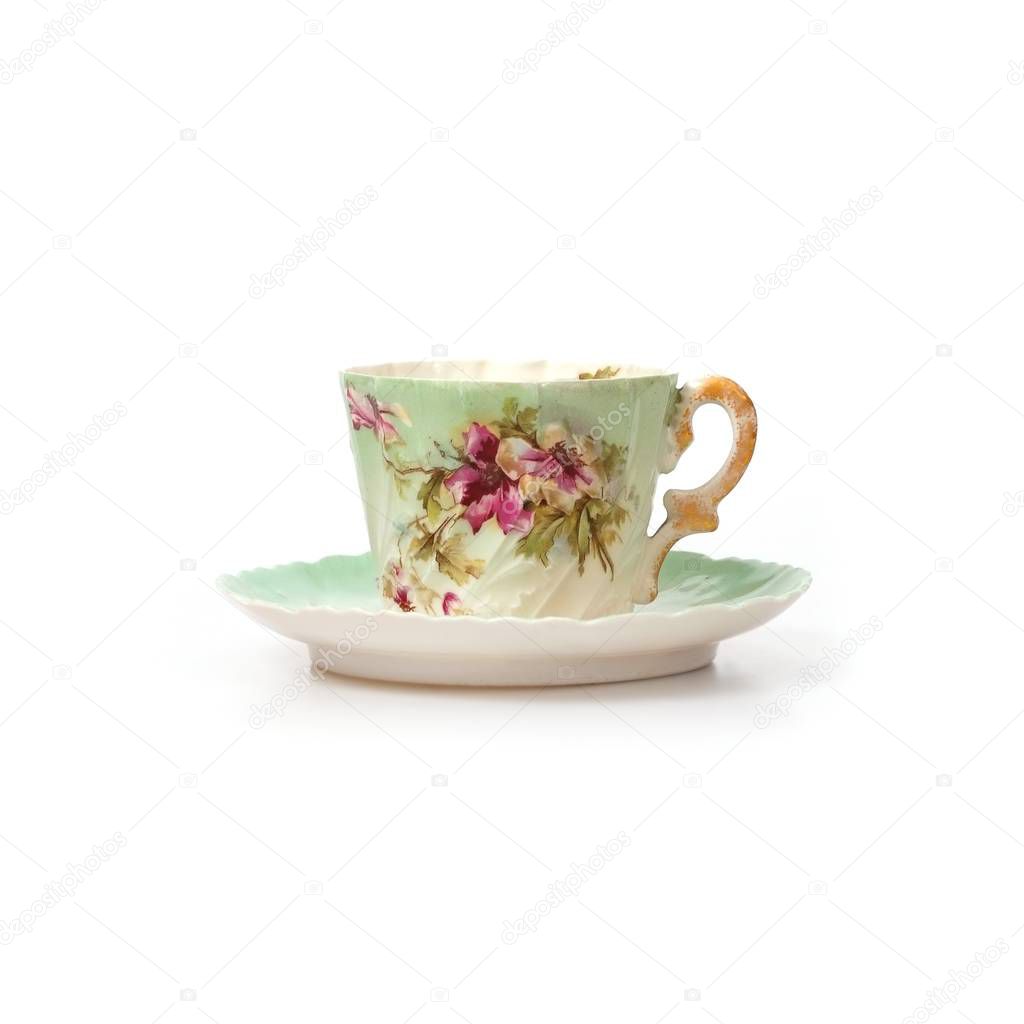 Beautiful porcelain tea cup isolated on a white background