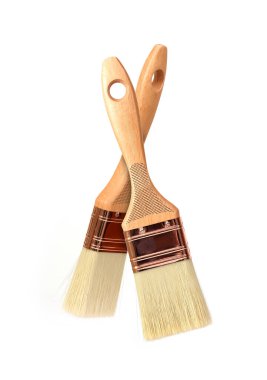 Beyaz arka planda izole edilmiş iki çekiç bitirme fırçası