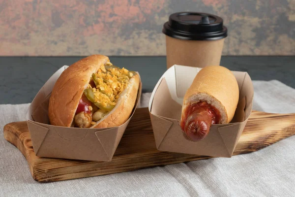 Eco packaging - Hot dog in craft packaging for delivery service. Fast food.