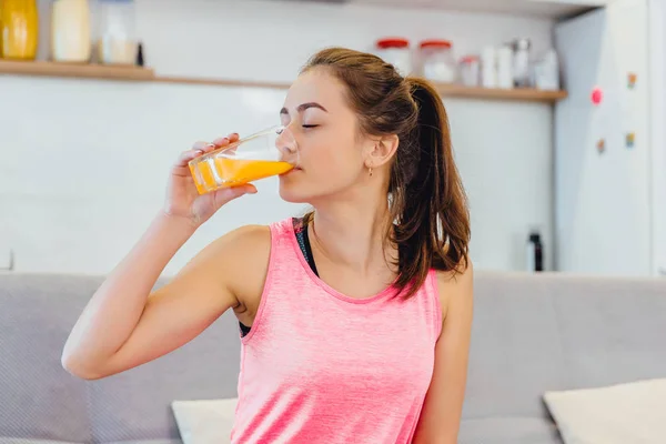 Young girl girl enjoys juice. Young girl girl enjoys juice following the rules of healthy eating.