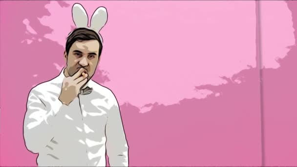 Beautiful boy standing on a pink background. During this dressed in a white shirt. Holding a carrot wants to burn it like a cigar. After a while, he throws carrots to the ground. Dressed in white — Stock Video