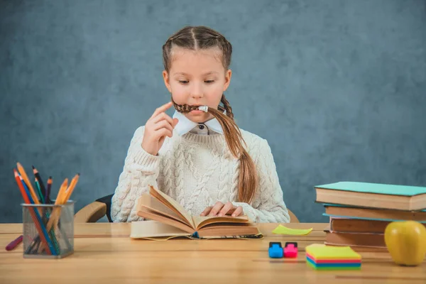 Involved in reading. Girl touches book on the grey background. Book store. Free book available read. Interesting literature. Development and education. — Stock Photo, Image