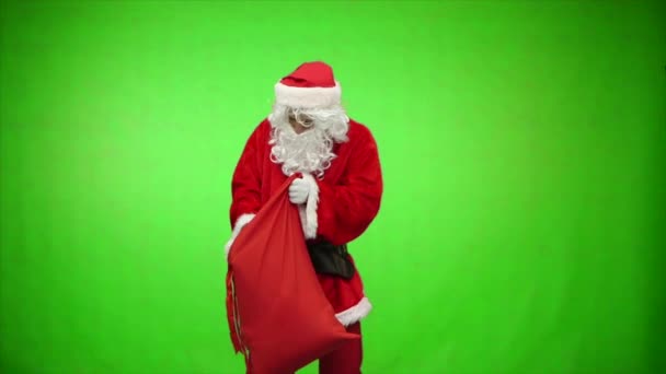 Santa Claus att få presenter ur sin väska. Färgtransparens — Stockvideo