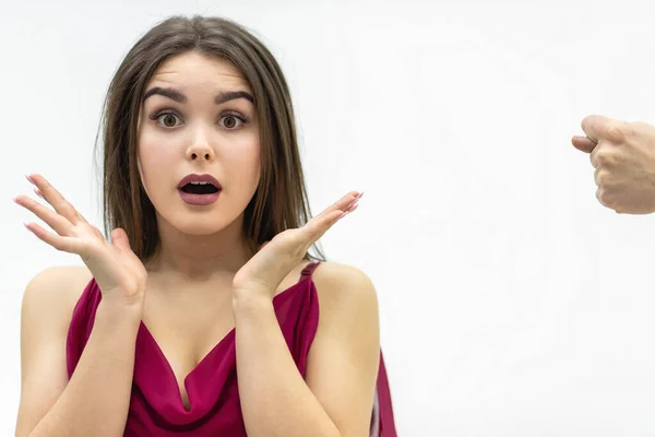 Rude man behaviour. Close up shot of girl completely shocked by her boyfriend attitude as he shows a zilch saying that she is going to get zero nothing. — Stock Photo, Image