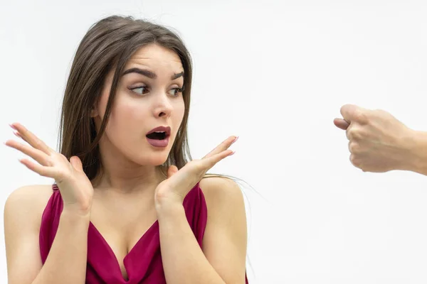 Rude man behaviour. Close up shot of girl completely shocked by her boyfriend attitude as he shows a zilch saying that she is going to get zero nothing. — Stock Photo, Image