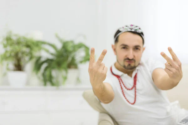 Photo of young businessman showing two fingers or victory gesture. — Stock Photo, Image