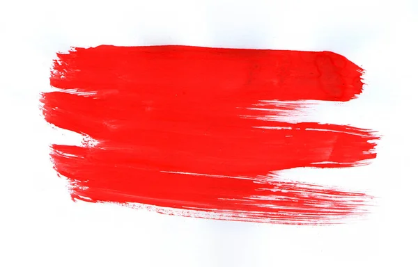Bright red bristle brush strokes texture on white paper. Abstract background. Paint mark.