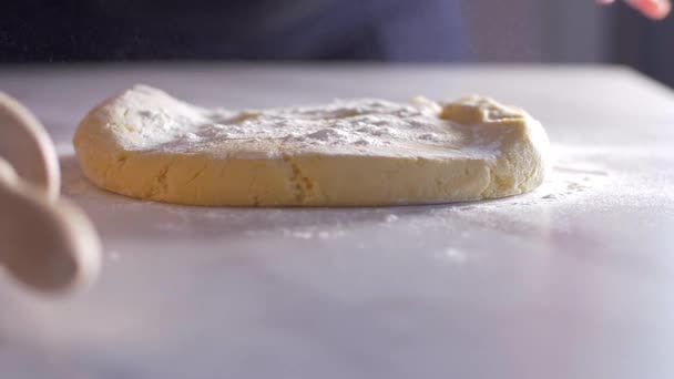 Rolling a dough with a rolling pin Slow motion — Stock Video