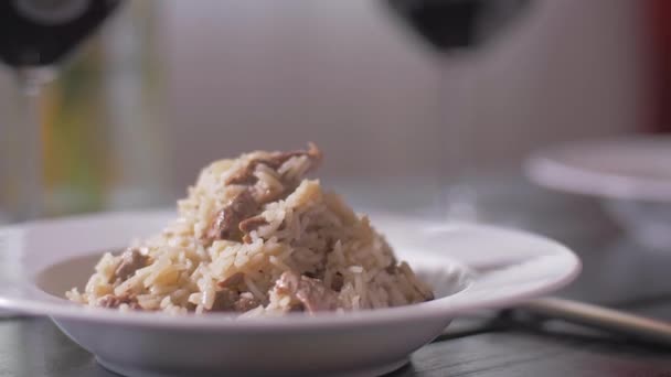 Garnish with rosemary risotto with veal fillet — Stock Video