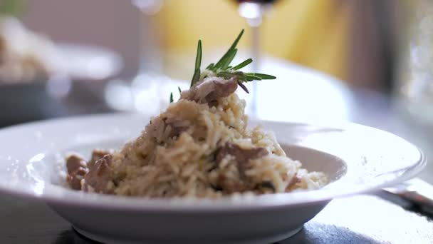 Tasty risotto with veal fillet prepared for two — Stock Video