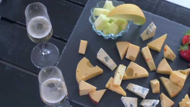 Romantic lunch with different types of cheese. — Stock Video