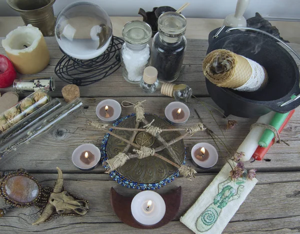 Magical instruments and ingredients on the table — Stock Photo, Image