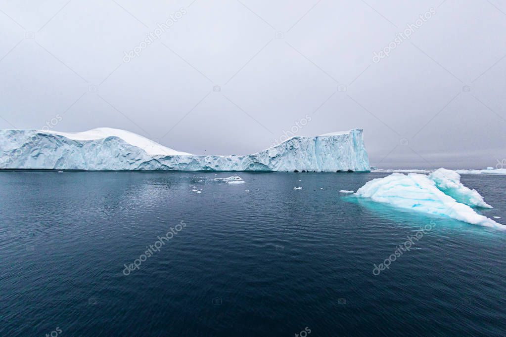 Arctic Icebergs on Arctic Ocean in Greenland