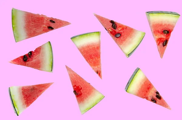 Wassermelonenscheiben Dreiecke Schneiden Rosa Hintergrund — Stockfoto