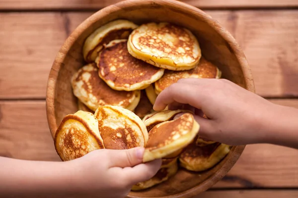 Delicious pancakes on wooden table with berries and fruits — Stock Photo, Image