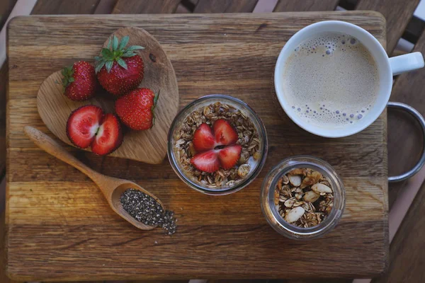 Chia seeds pudding on wooden background wiyh coffee. breakfast set — Stock Photo, Image