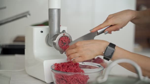 Problems with process lard or meat in minced meat on a huge meat grinder at a meat factory closeup. — Stock Video