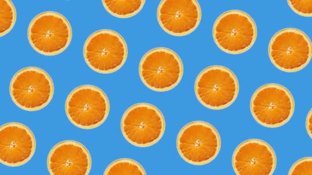 Loopable modern blue geometric backgroud with moving spinning oranges — Stock Video