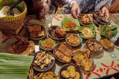 a set of various dishes for food.