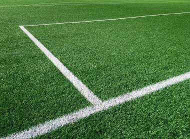 Stadium. Green grass soccer field with white markings. clipart
