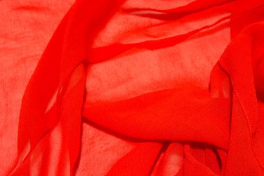 Bu kırmızı bir kumaşın yakın plan fotoğrafı.