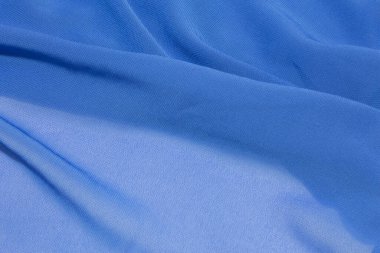 Bu mavi katıksız kumaşın fotoğrafı.