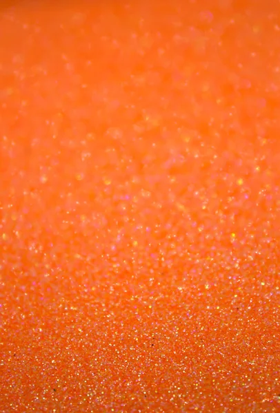 Orange glitter shiny background