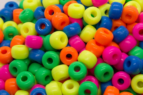 Colorful plastic beads background