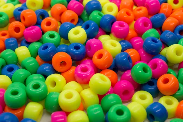 Colorful plastic beads background