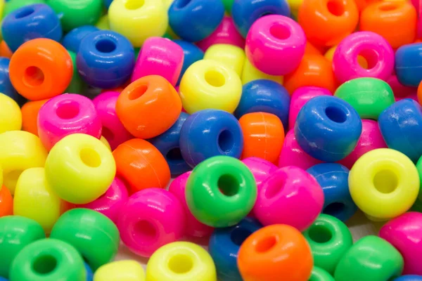 Colorful plastic beads background