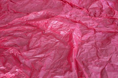 Bu kırmızı peçete arkaplanının fotoğrafı.