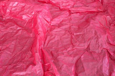 Bu kırmızı peçete arkaplanının fotoğrafı.