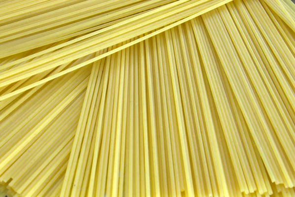 Egy Fotó Főzés Nélküli Spagetti Tészta Háttér — Stock Fotó