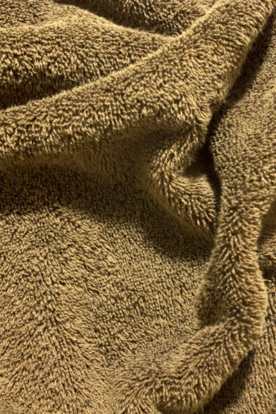 Jest Zbliżenie Zdjęcie Teksturowanego Brązowego Ręcznika Tła — Zdjęcie stockowe