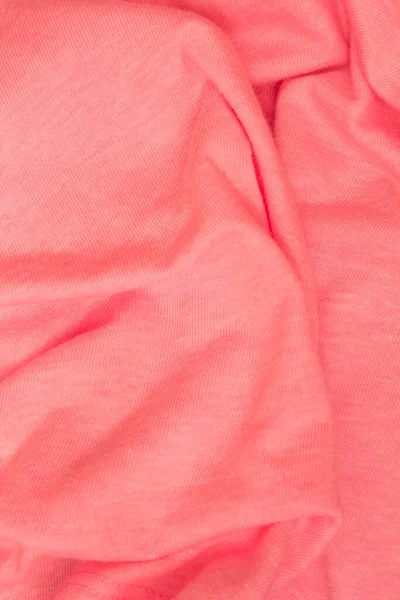 ピンクの布の背景の写真です — ストック写真