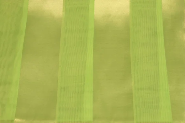 Lime Green Polyester Kumaşın Katıksız Eklenmiş Bir Fotoğrafı — Stok fotoğraf