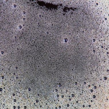 Köpüklü kahve köpüğünün arka planı.