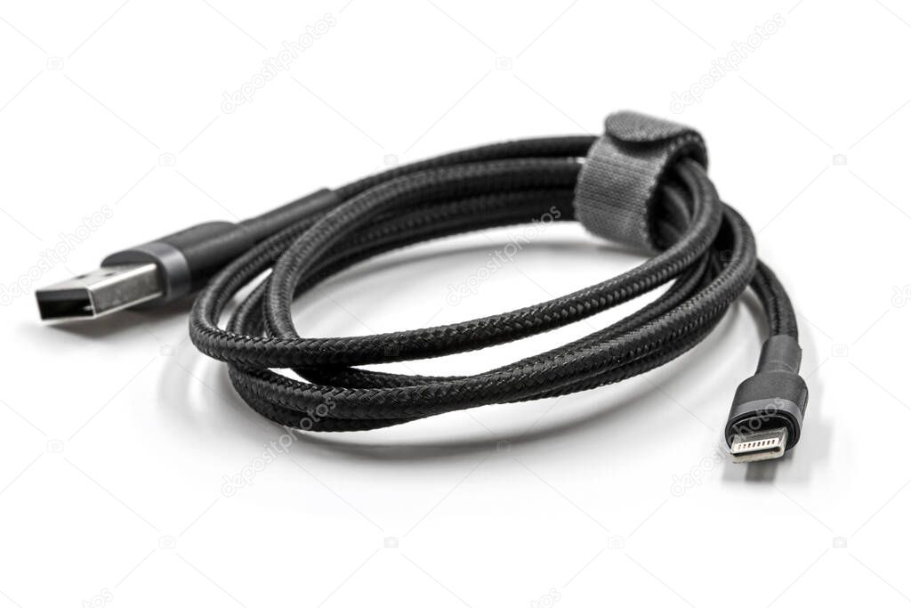Black adapter USB to micro USB type c data and power cable isolated on white background. Closeup