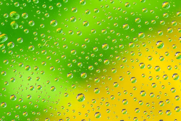 Wassertropfen Auf Grün Gelbem Hintergrund Ansicht Von Oben Nahaufnahme — Stockfoto