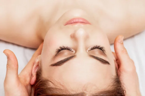Massage Therapist Hands Putting Massage Stones Eyes Young Woman Eye — Stock Photo, Image