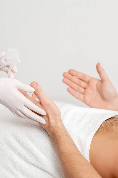 Nurse Hand Sanitizing Hands Male Patient Hospital Coronavirus Protection Concept — Stock Photo, Image