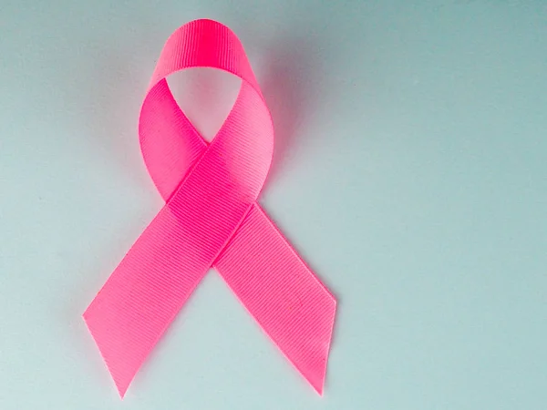 Pink ribbon on blue background. Breast cancer awareness concept — Stock Photo, Image