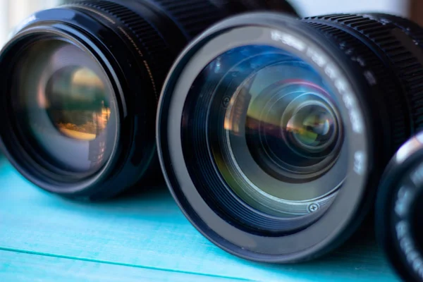 lens digital camera, selective focus, close-up, side with reflection, bokeh, isolated on white background