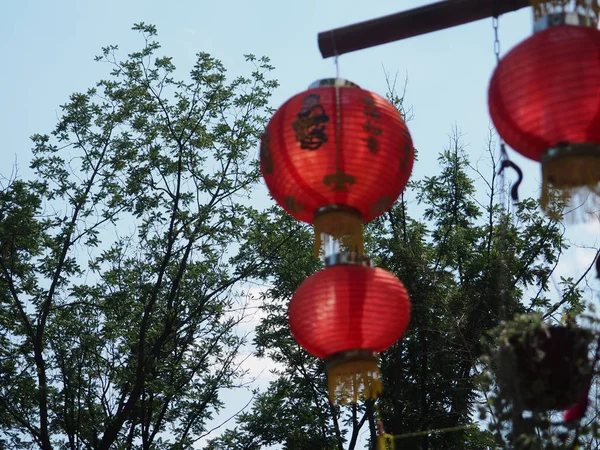 the red Chinese paper lanterns are decorated as the symbol for lucky and happiness during festival time,it is a traditional culture for Chinese people