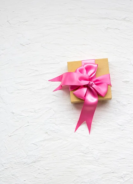 gift box with gift tag. pink satin gift bow