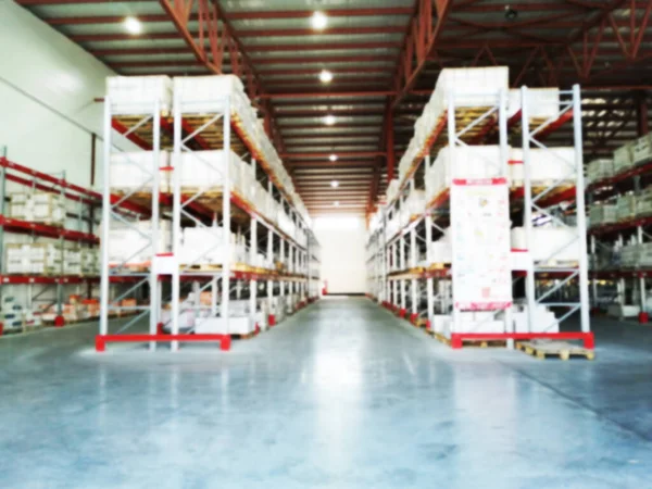 Shelving System With Boxes in Distribution Warehouse, Large industrial warehouse with high racks.