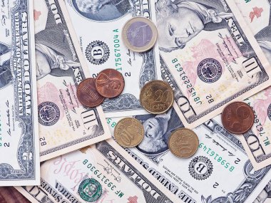 Avrupa ve Dolar banknotları ve sikkelerinin arkaplanı, Maliye ve yoksulluk kavramı.